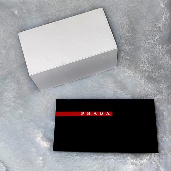 Prada SunglassesauthenticUnisexblackNever worn!!!